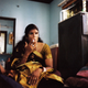 Sheethal smokes a cigarette in her apartment in Pondicherry. Sheethal acts as a guru to many of the younger kothis in this community who refer to her as their mother and she to them as her daughters.